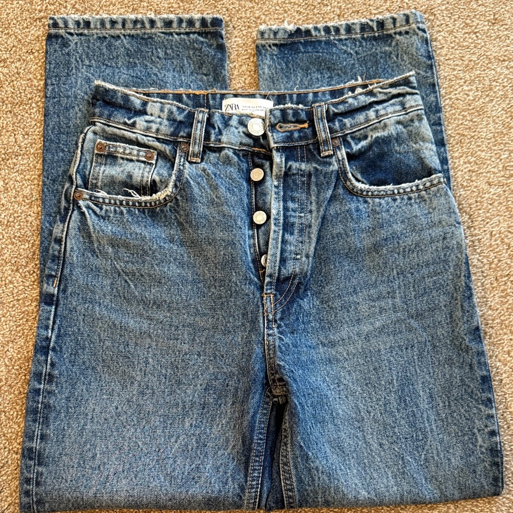 Zara denim jeans in darker wash. Size USA 2 with buttons. Like new